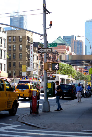 A person putting up the notorious 'Apartment for Rent' flyers