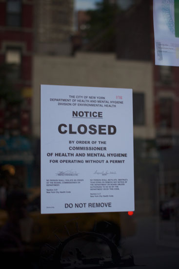 The notice of closure on the front of Zigolini's