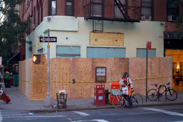 The plywood-covered exterior of the former Lime Jungle