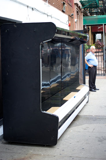 The fridge-like object outside the store