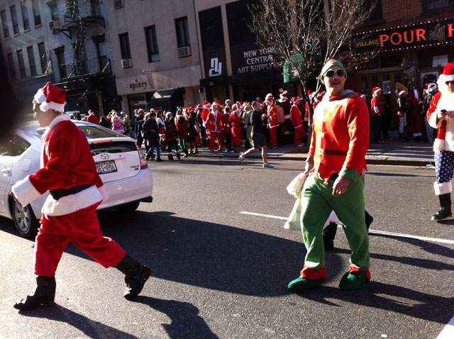 Santas participating in NYC SantaCon 2011