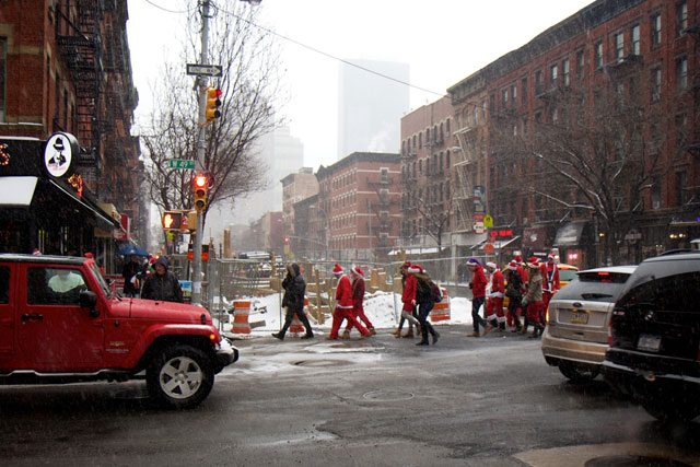 Santas wandering 9th Ave