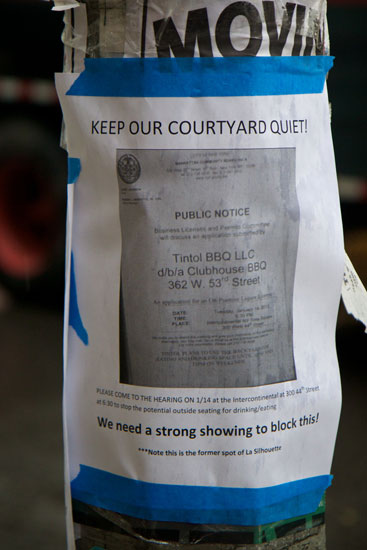 A printout of Clubhouse BBQ's permit application notice with a rallying opposition message around it